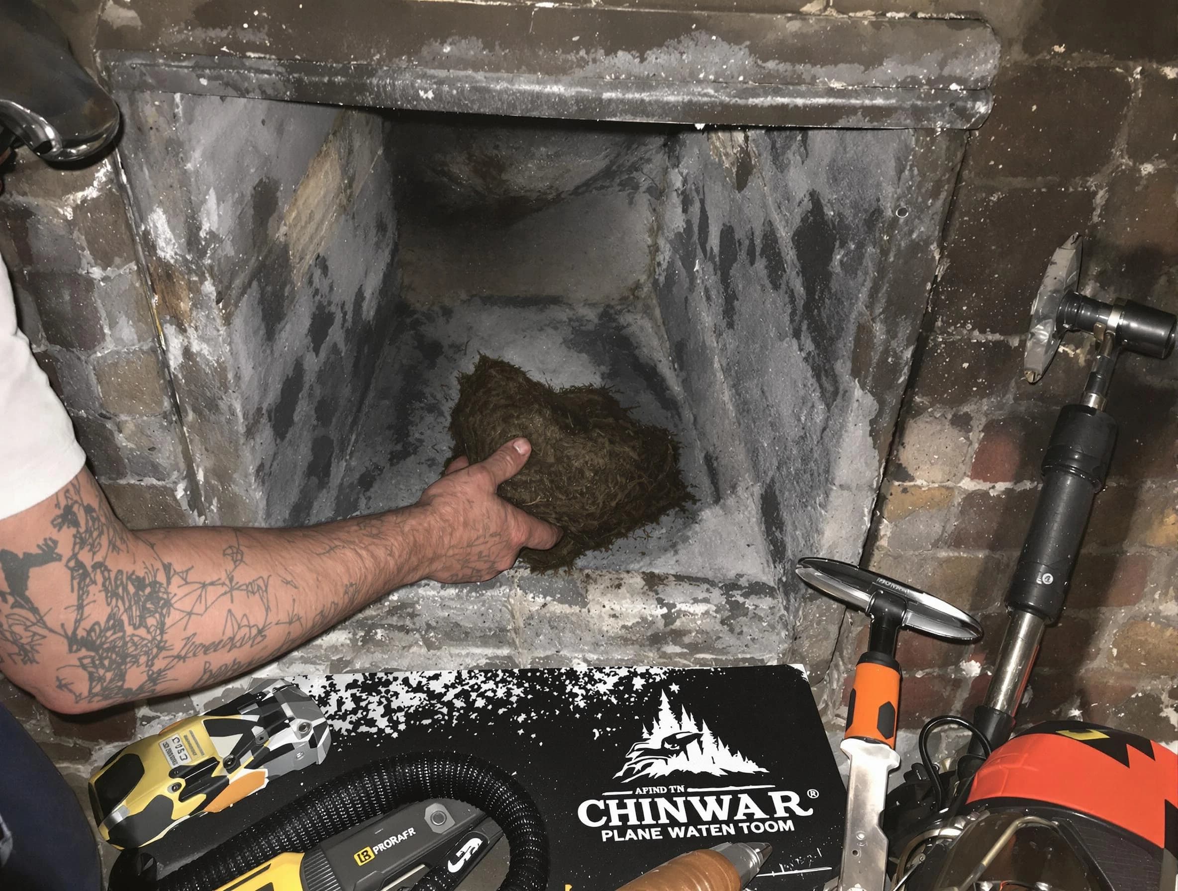 Oakmont Chimney Sweep safely removing debris and screening chimney in Oakmont, PA